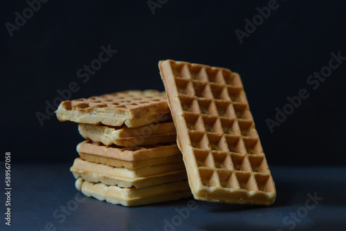 Wallpaper Mural Belgian waffles on black stoneplate and black background Torontodigital.ca