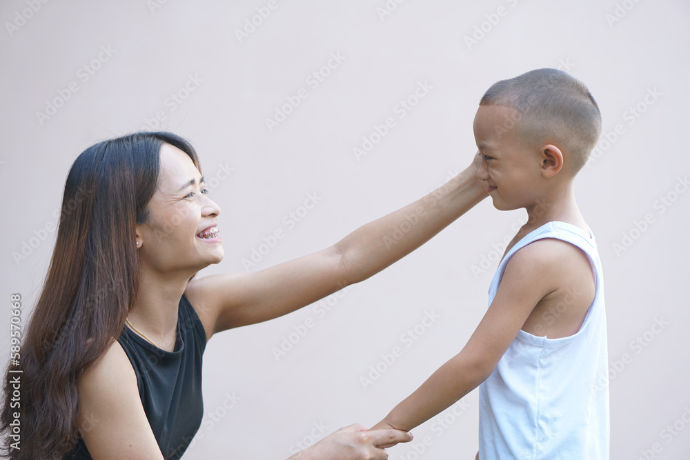 Mother and child playing happily Mother and child playing happily