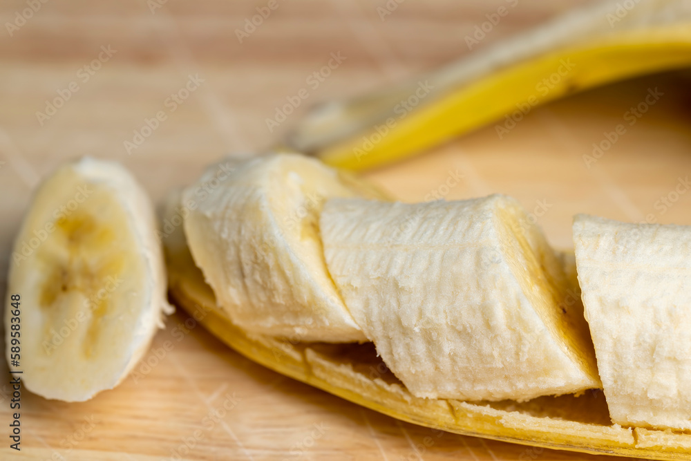 Peeled ripe yellow banana, close up Peeled ripe yellow banana, close up