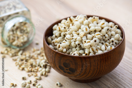 Hot Boiled Job’s Tears millet seed from boiler. White boiled Job’s Tears is highly nutritious cereal healthy fresh organic in salad dish.