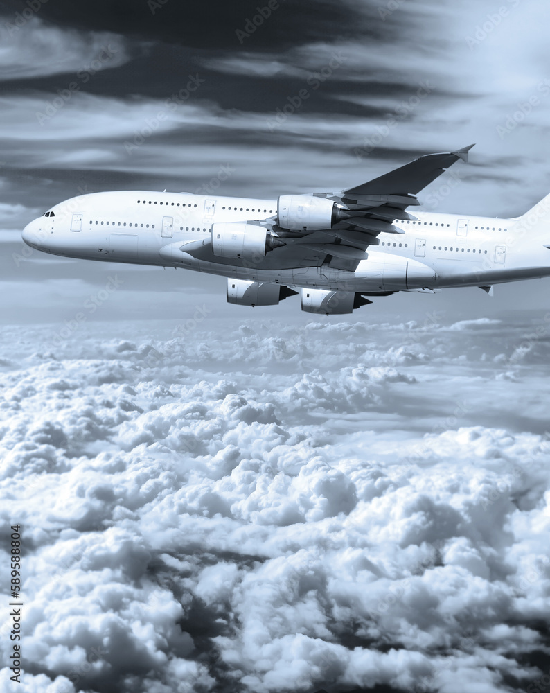 Passenger commercial airplane flying in the sky above clouds. Concept of fast modern travel Passenger commercial airplane flying in the sky above clouds. Concept of fast modern travel