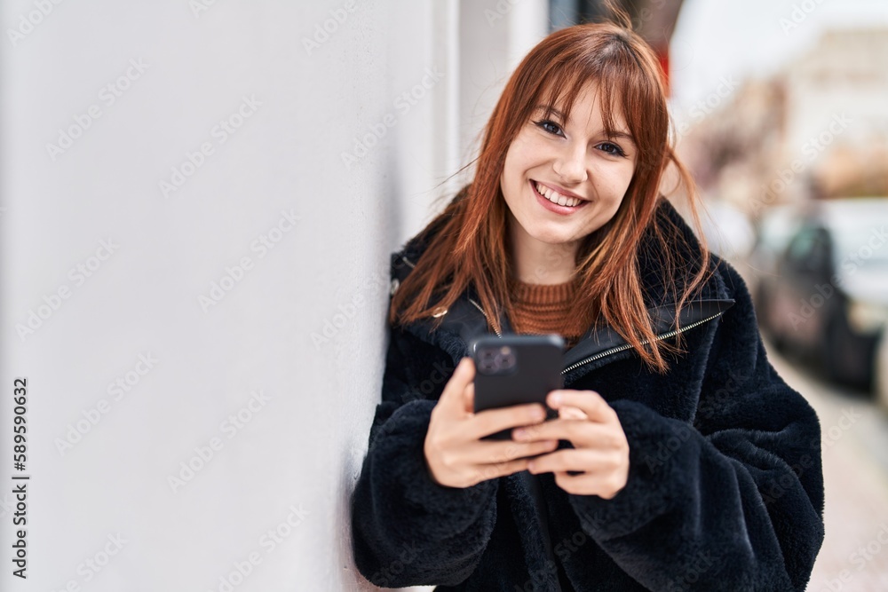 Young woman smiling confident using smartphone at street Young woman smiling confident using smartphone at street