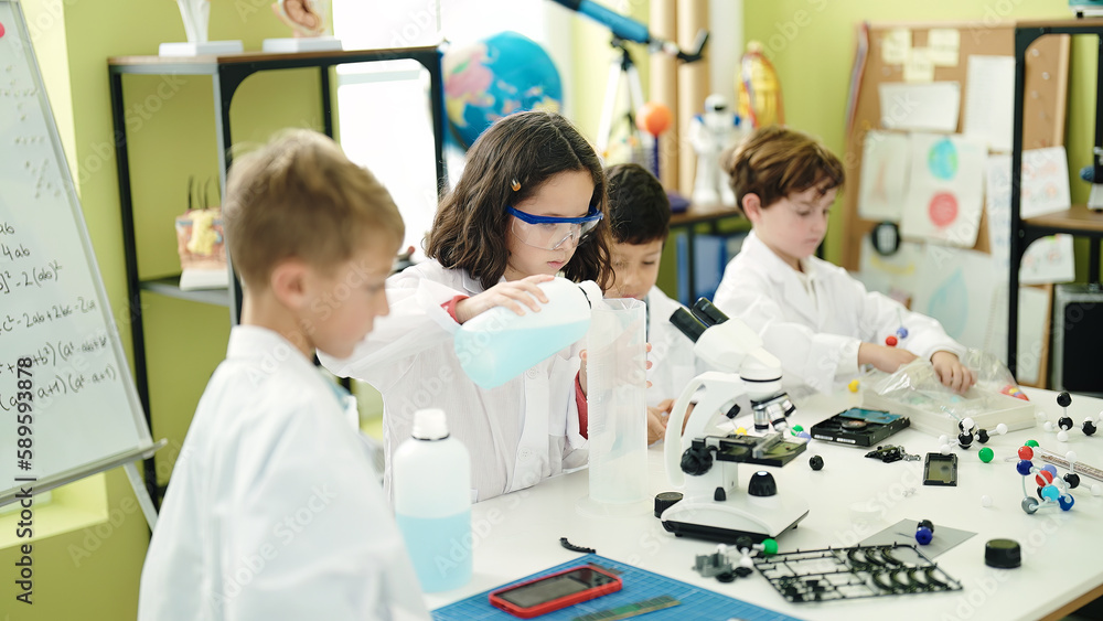 Group of kids students pouring liquid on bottl doing experiment at laboratory classroom Group of kids students pouring liquid on bottl doing experiment at laboratory classroom