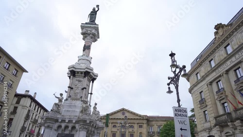 PAMPLONA, Spain - July 04 2022: Monument to the Fueros, in the center of Pamplona. Erected on Paseo de Sarasate in 1903, it came to symbolise the Navarrese reaction in defence of their rights.  photo