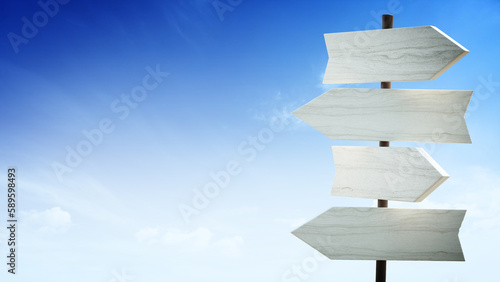Signboard with blank arrows against blue sky background. 3D illustration © Destina