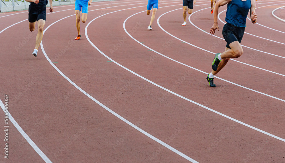 runner leader run ahead of sprint race on turn stadium track, summer ...