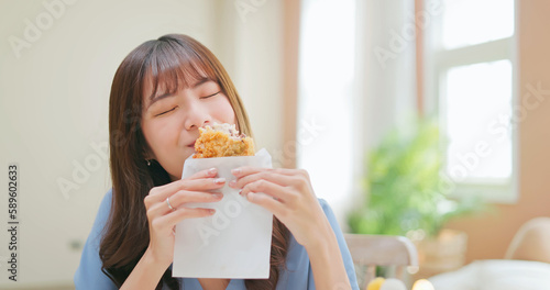 girl bit fried chicken cutlet