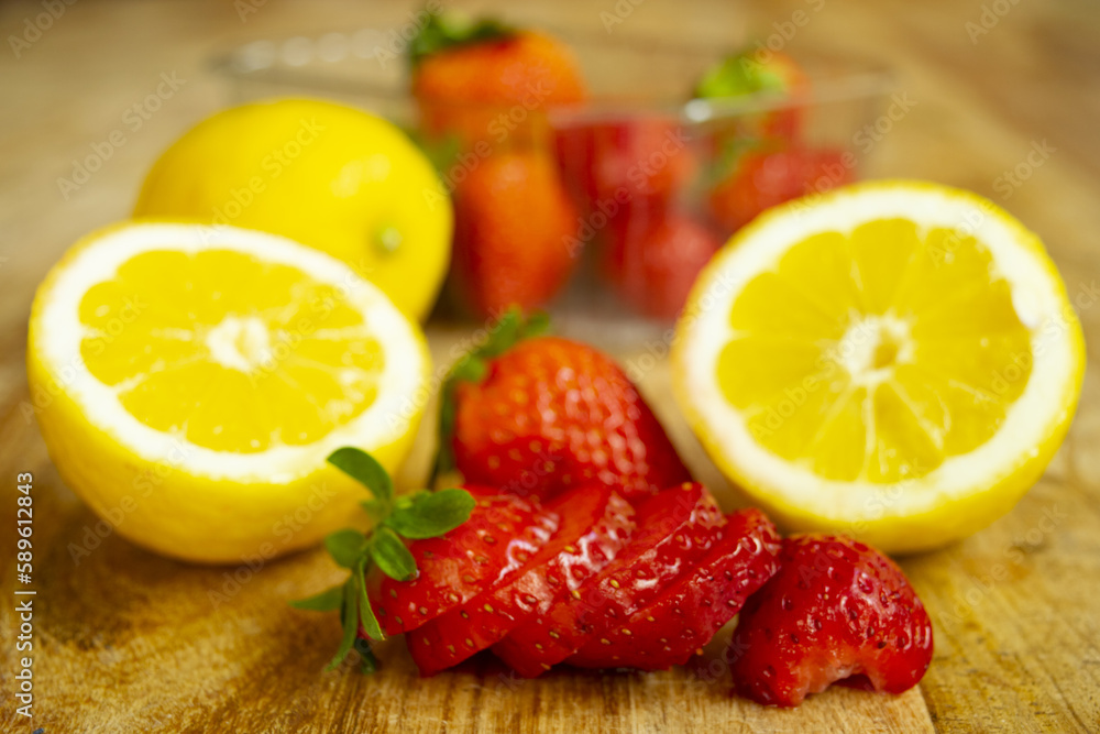 sliced strawberries and lemons sliced strawberries and lemons
