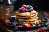 pancakes with berries and syrup