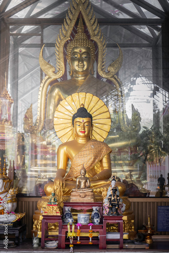 golden buddha in temples in Thailand