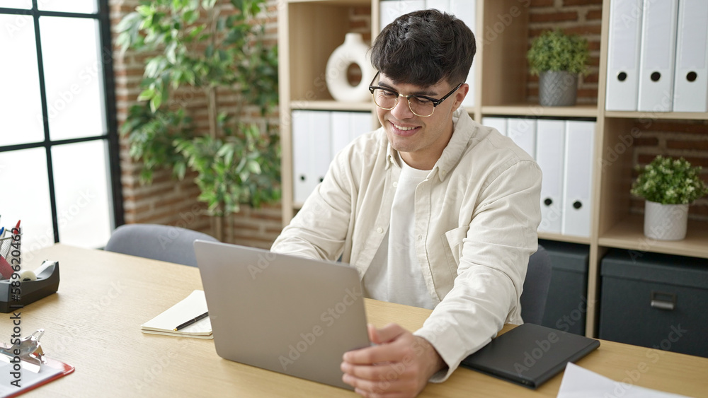 Young hispanic man business worker using laptop working at office Young hispanic man business worker using laptop working at office