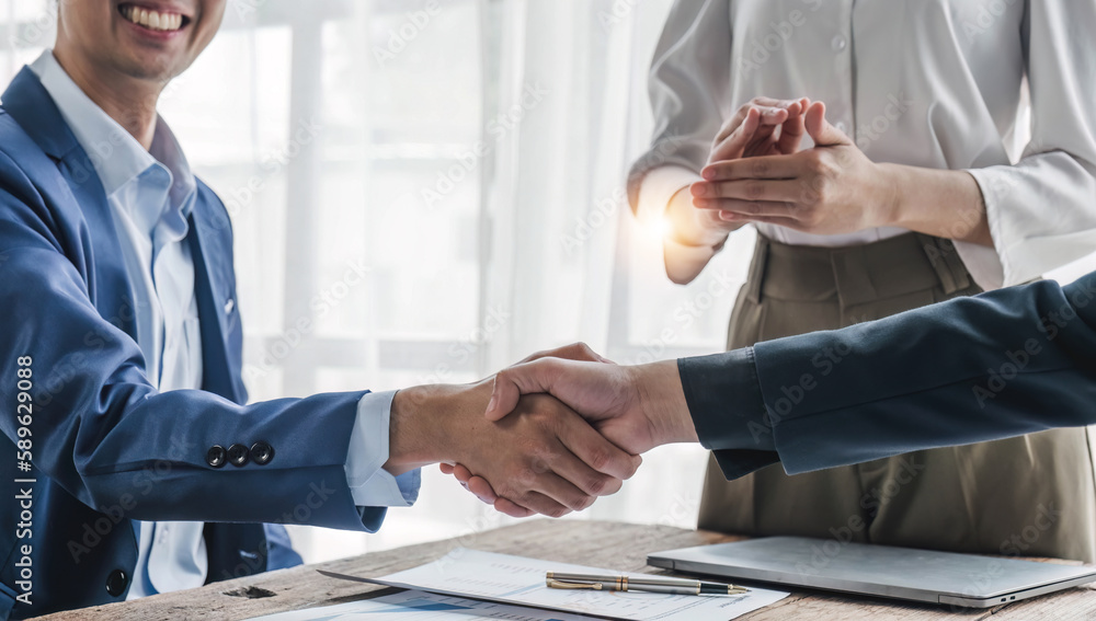 Business handshake for teamwork of business merger and acquisition,successful negotiate,hand shake,two businessman shake hand with partner to celebration partnership and business deal concept. Business handshake for teamwork of business merger and acquisition,successful negotiate,hand shake,two businessman shake hand with partner to celebration partnership and business deal concept.