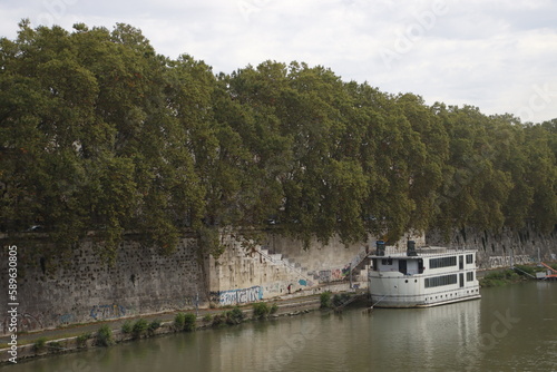 Boats on the Tiber river, Rome photo