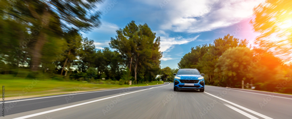 rental car in spain mountain landscape road at sunset