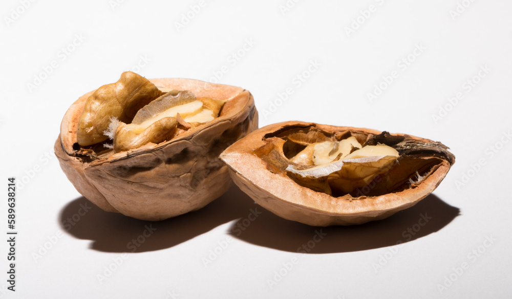 Walnuts are rounded, single-seeded stone fruits of the walnut tree. Cracking a nut. Walnuts are rounded, single-seeded stone fruits of the walnut tree. Cracking a nut.