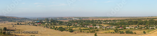 Landscapes of the Northern regions of Moldova. A pastoral panorama with nature. Moldovan villages and houses and streets.