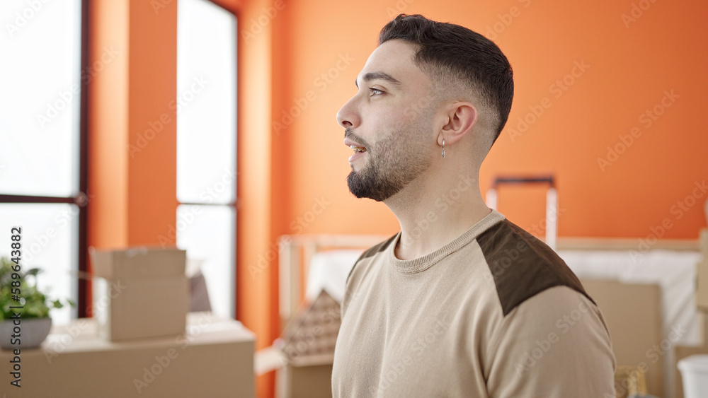 Young arab man smiling confident standing at new home Young arab man smiling confident standing at new home
