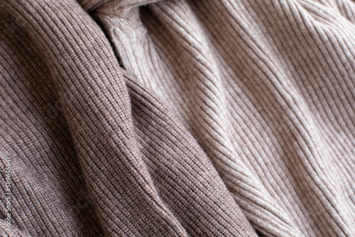 Close up of knitted warm sweaters clothes close up