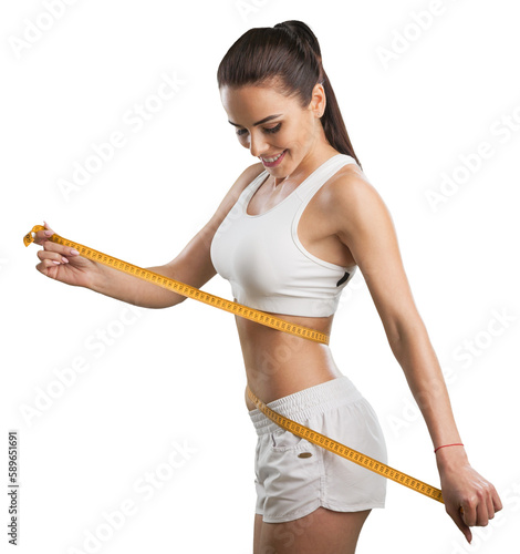 Obraz na płótnie The girl taking measurements of her body in white fitness clothes w salonie