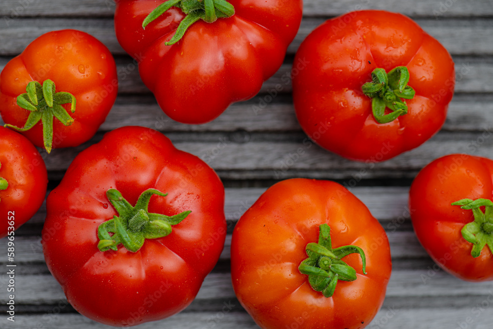 Red ripe tomatoes on a wooden floot. Red ripe tomatoes on a wooden floot.