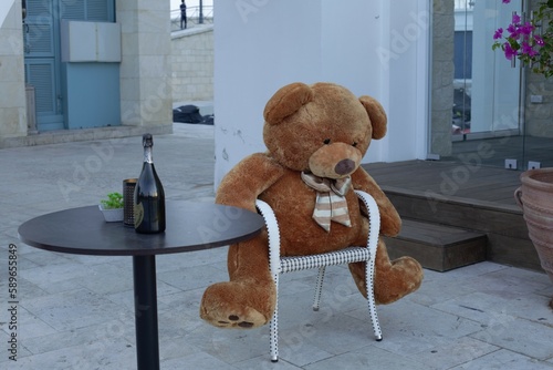teddy bear sitting on a chair