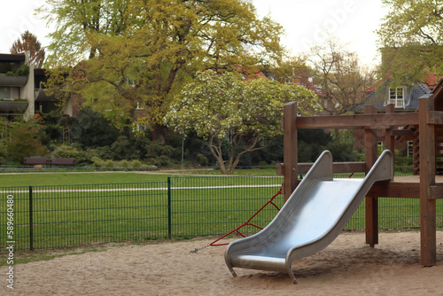 Eco Kids playground in the spring park on the sunset