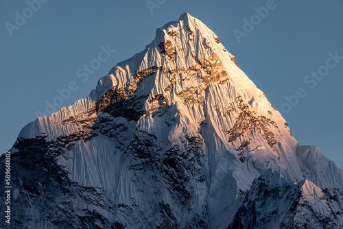 Sunset on Ama Dablam (6812m): tip of Ama Dablam being gently touched by last rays of sun. See ya tomorrow... Photo taken from the village of Dzonghla photo