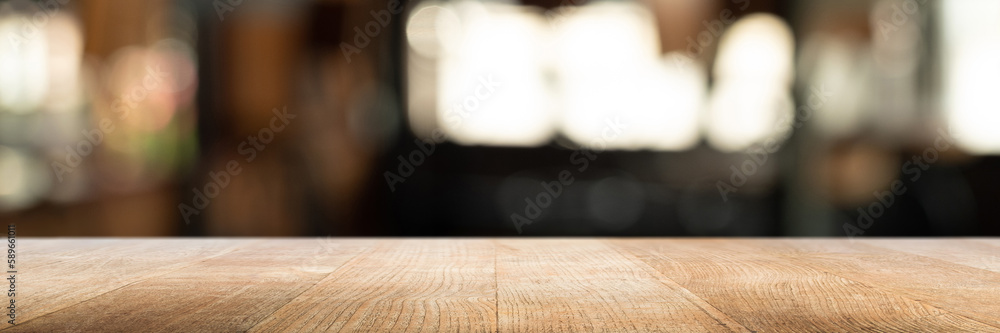 Wooden desk with blurred restaurant background, banner. Wooden desk with blurred restaurant background, banner.