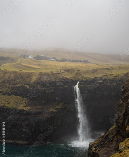 Múlafossur waterfall bellow Gásadalur hamlet