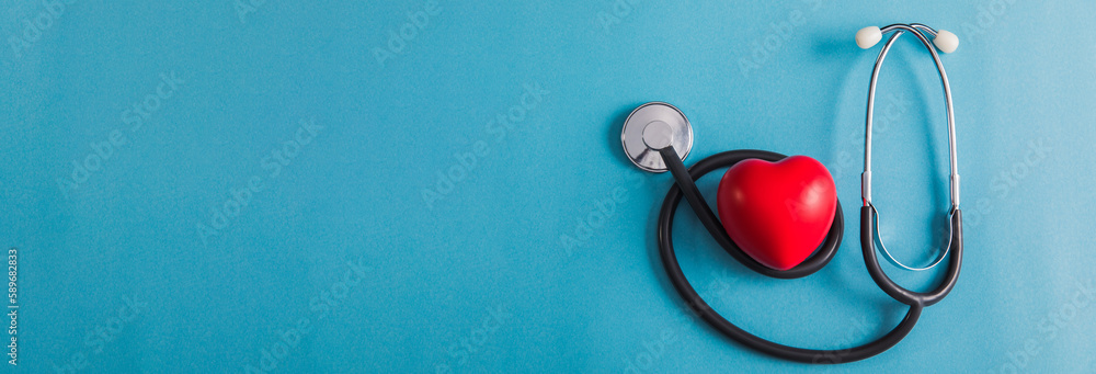 red heart and stethoscope on table red heart and stethoscope on table