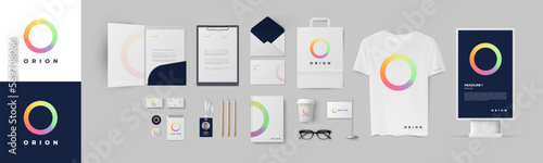 Branding presentation with color rainbow logo and dark blue background, corporate style identity template. Stationery design set with folder, visiting card and A4 form.