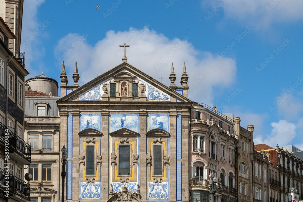 Oporto, Portugal. April 12 , 2022: Church of the azulejos congregados and blue sky.