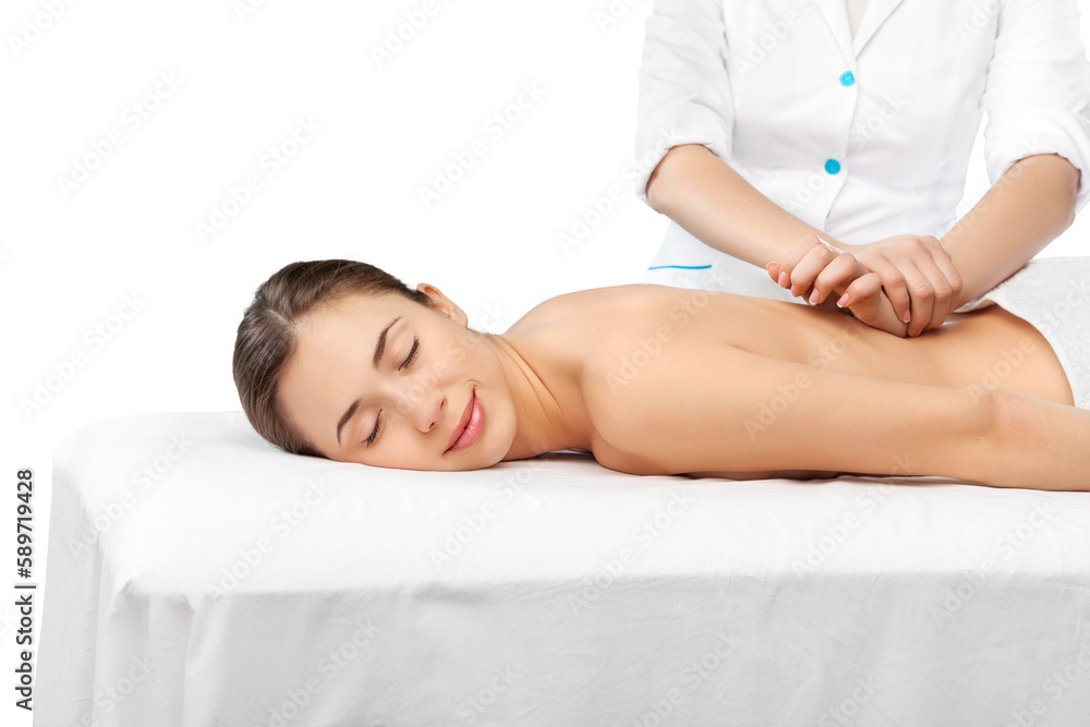 Beautiful young woman relaxing with hand massage at beauty spa Beautiful young woman relaxing with hand massage at beauty spa