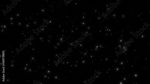 Particles flying on a black background. 