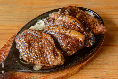 Brazilian picanha barbecue roasted on the grill and served in slices