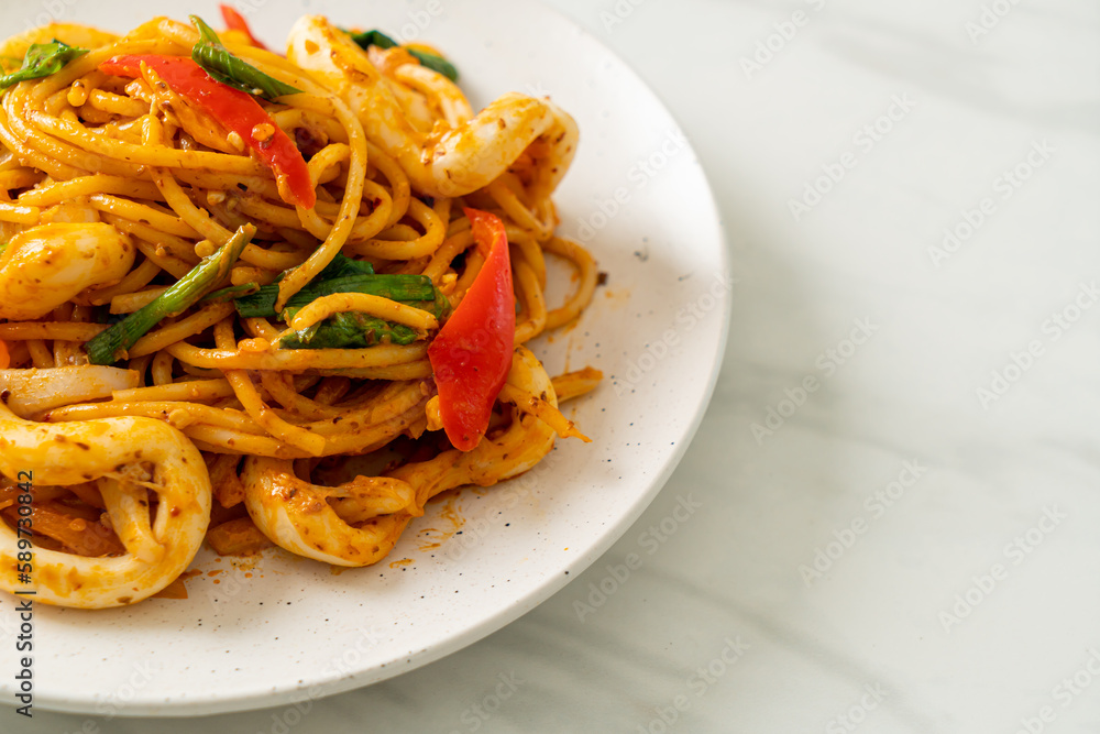 stir-fried spaghetti with salted egg and squid stir-fried spaghetti with salted egg and squid