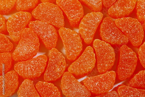 sweet orange flavored sugar candy texture seamless background,top view