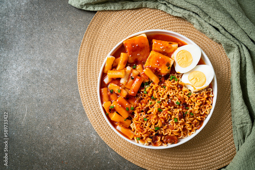 Korean instant noodles with Korean rice cake and fish cake and boiled egg photo