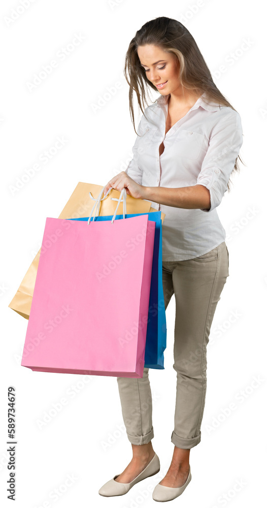 Young woman with shopping bags isolated on white Young woman with shopping bags isolated on white