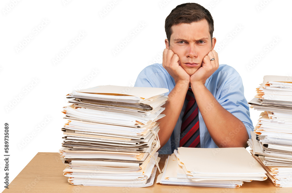 Tired young businessman with many business papers Tired young businessman with many business papers