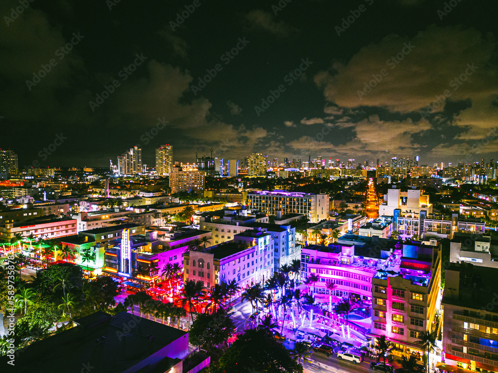 Fototapeta premium Ocean Drive in South Beach Miami Florida by drone at Night 4k