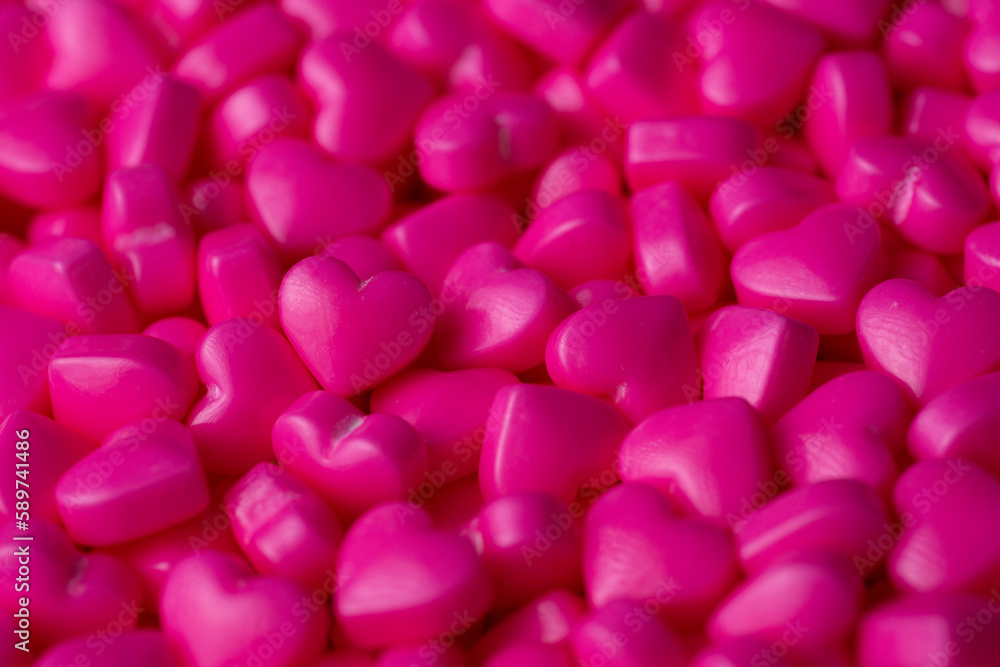 Pink heart sugar sprinkles close up texture