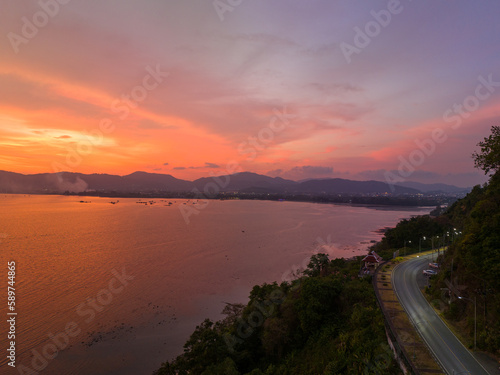 .aerial view stunning sky in sunset above the sea..colorful cloud in bright sky of sunset above the ocean at Khao Khad Phuket. .Majestic sunset or sunrise landscape Amazing ligh