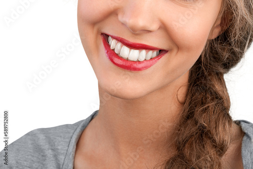 Close-up of Pretty young woman face smile isolated on white background