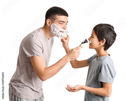 Father teaching his little ...