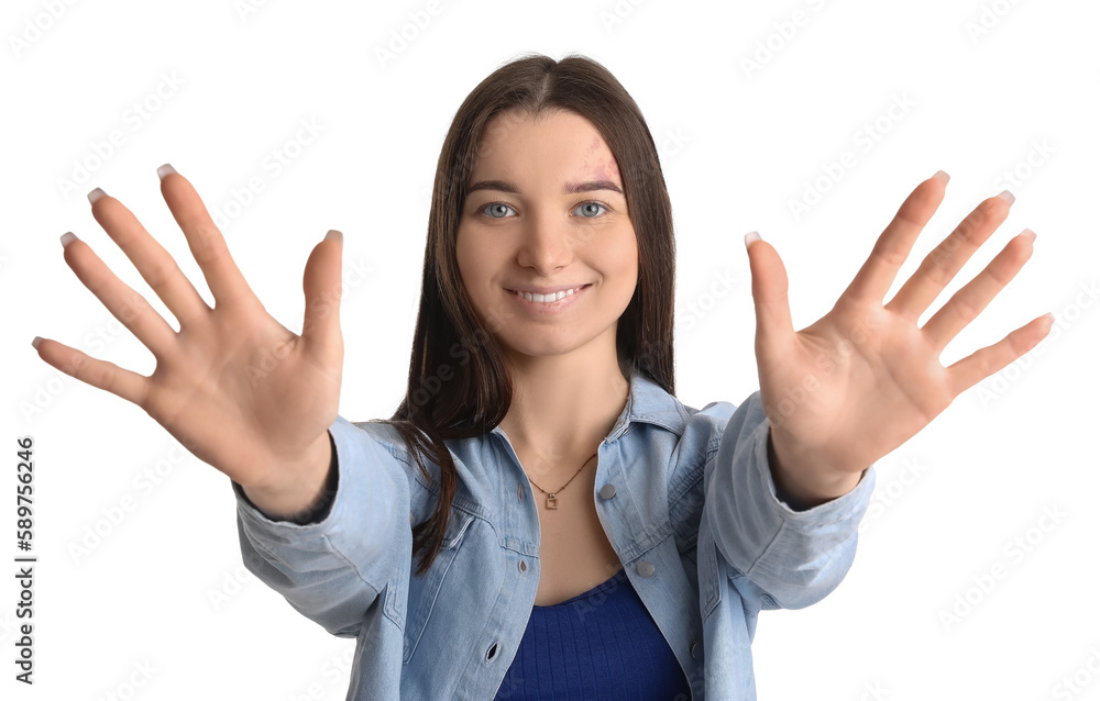 Young woman in shirt showing hands on white background, closeup Young woman in shirt showing hands on white background, closeup