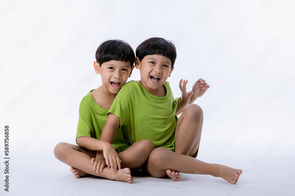 portrait-of-cute-asian-twins-boys-two-little-boys-twins-isolated-on