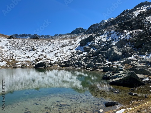 Wallpaper Mural High alpine lakes next to the mountain hut (Chamanna da Grialetsch CAS or Grialetsch-Hütte SAC) in the massif of the Albula Alps, Zernez - Canton of Grisons, Switzerland (Kanton Graubünden, Schweiz) Torontodigital.ca