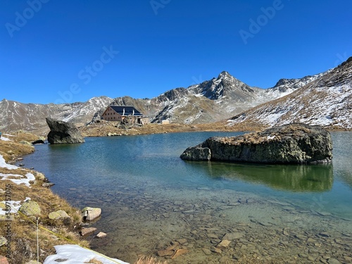 High alpine lakes next to the mountain hut (Chamanna da Grialetsch CAS or Grialetsch-Hütte SAC) in the massif of the Albula Alps, Zernez - Canton of Grisons, Switzerland (Kanton Graubünden, Schweiz) photo