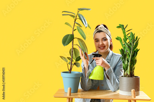 Young woman and shelf with ...